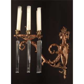 Lot 351 - Set of six (6) bronze six arm sconces with pendants from numerous MGM productions