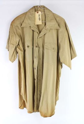 John Wayne Machin Designer Beige Short-Sleeve Shirt. With Production Tag Reading ’John Wayne’. | Ewbank’s