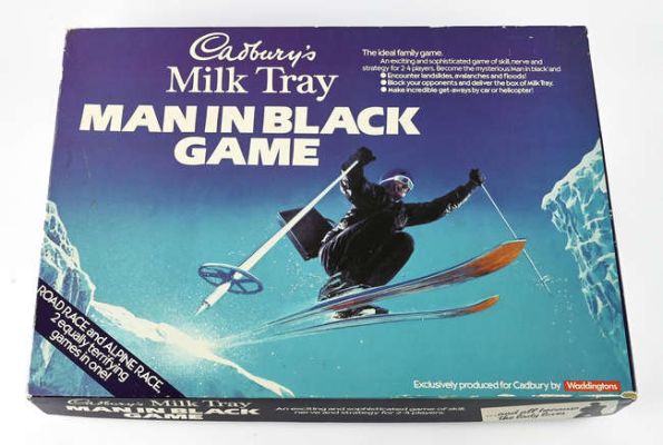Lot 2395 - James Bond 007 - Cadburys Milk Tray TV Advertisement - The Man in Black - " All Because The Lady… | Ewbank’s