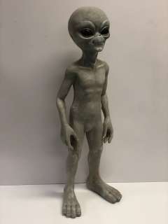 Standing grey alien figure - Approx 24" tall (From the superhero show) | Direct Liquidation