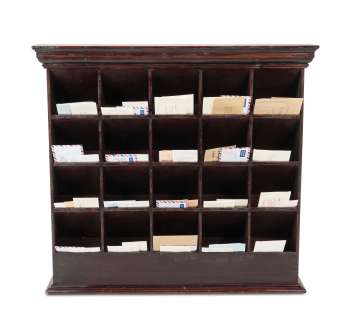 The Crown | A stained pine and plywood letter rackFirst seen in Season 1, Episode 1, ’Wolferton Splash’ (qty) | Bonhams