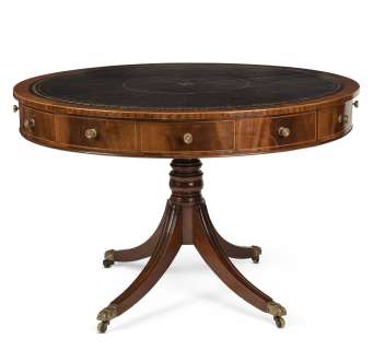 The Crown | A late 19th century mahogany drum-top library table, in the George III styleUsed in Seasons 3 & 4 in the Cabinet Room Ante-room set | Bonhams