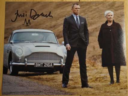 James Bond 007: Skyfall - Judi Dench as "M" with Aston Martin - autopgraph, photo, signed with Certified Genuine b´bc holographic COA