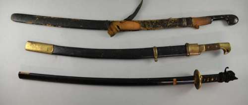 Three swords, one samurai, used as props or gifts. | Ewbank’s