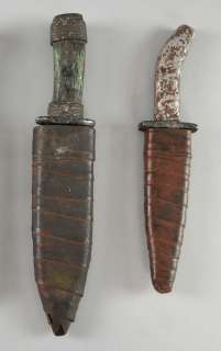 Conan the Barbarian/Conan The Destroyer - Two daggers made of cast metal, each with leather… | Ewbank’s