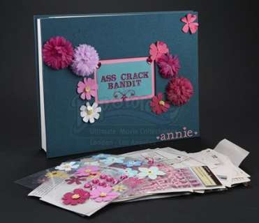 Community - Lot 120 - S5E03 - Basic Intergluteal Numismatics: Annie Edison‘s (as portrayed by Alison Brie) Ass Crack Bandit Binder