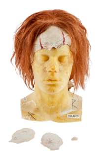 Lot 355 - IT | BILL SKARSGARD "PENNYWISE" WIG, COWL, AND FACIAL PROSTHETICS (WITH DVD)