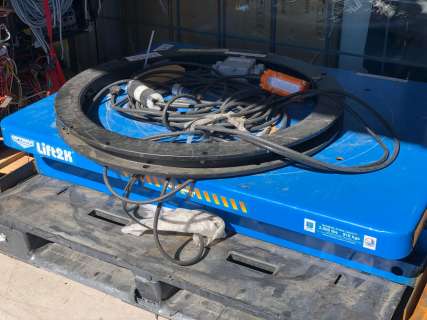 Optimus Lift2k platform electric scissor lift (From the partially animated Blockbuster Movie) | Direct Liquidation