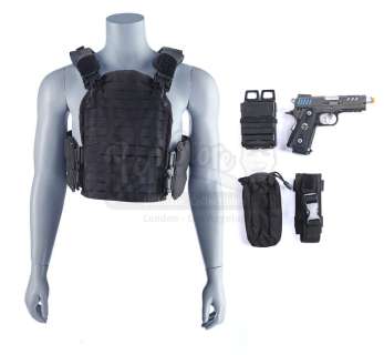 Marvel‘s Agents of S.H.I.E.L.D. - Lot 68 - Grant Ward‘s Tactical Vest and Bloodied Stunt I.C.E.R. Pistol