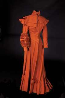 Lot 415 - Eva Gabor three-piece suit w/capelet, muff, & tie Gigi