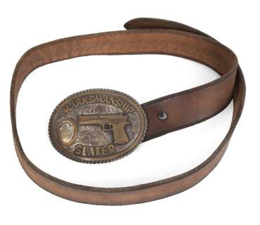 Lot 567 - ARNOLD SCHWARZENEGGER "JACK SLATER" BELT AND BUCKLE FROM LAST ACTION HERO