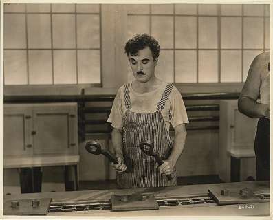 Lot 156 - Charlie Chaplin vintage photograph from Modern Times.