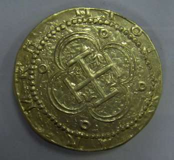 A prop gold coin from ’Pirates Of The Caribbean: The Curse Of The Black Pearl’, 2003 | Bonhams