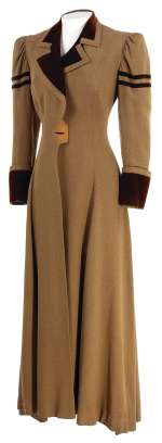 Lot 322 - Claire Trevor "Gold Dust Nelson" tan wool coat designed by Robert Kalloch made for Honky Tonk.