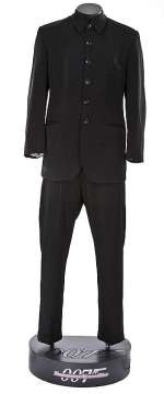 Lot 562 - Jonathan Pryce "Elliot Carter" suit and display from Tomorrow Never Dies.