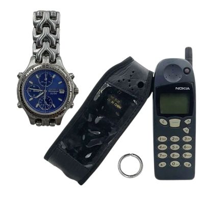 The Smashing Machine Mark Kerr (Dwayne Johnson) Screen Used Phone W/ Case, Earring & Watch | VIP Fan Auctions