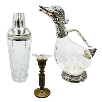 Lot 58: Mythic Quest David Brittlesbee (David Hornsby) Screen Used Duck Wine Pourer, Martini Shaker & Candles, 1 Broken | VIP Fan Auctions
