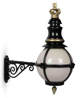The Crown | A set of four large black die cast aluminium ’globe’ wall lights made by William Sugg & Co. First seen in Season 2, for the Buckingham Palace Exterior set (4) | Bonhams
