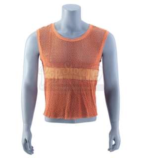 FIGHT CLUB (1999) - Lot 252 - Tyler Durden‘s (Brad Pitt) Orange Fishnet Tank Top
