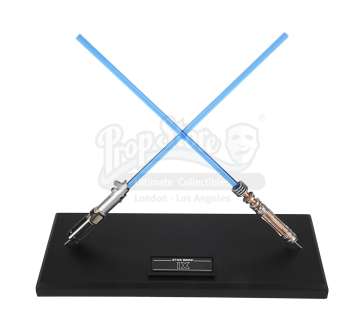 STAR WARS: THE RISE OF SKYWALKER (2019) - Lot 771 - Head of Department Crossed Lightsaber Crew Gift