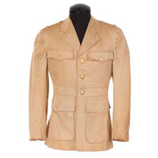 Lot 57 - Robert Taylor “Ensign Alan Drake” tan military jacket designed by Gile Steele from Flight Command