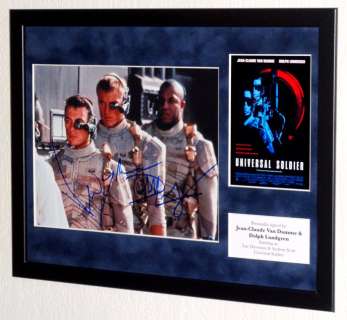Universal Soldier - Jean-Claude Van Damme & Dolph Lundgren (Luc & Andrew) Premium Framed, DOUBLE signed, COA | Catawiki