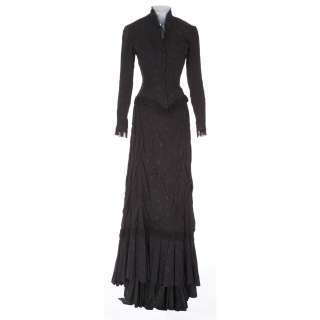 Lot 243 - Katy Jurado “Senora Devereaux” black period dress designed by Travilla from Broken Lance