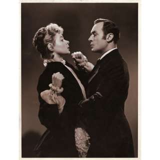 Lot 392 - Gaslight pair of vintage MGM portrait double-weight stills of Ingrid Bergman and Charles Boyer