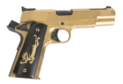 Lot 1063 - "FACE OFF" GOLD GUN PROP