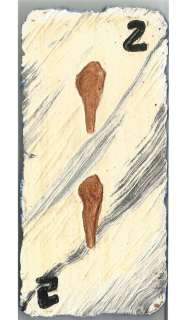 Flintstones Viva Rock Vegas prop two of clubs playing card made to look like its made of stone seen | Piece of the Past