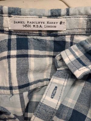 Daniel Radcliffe‘s shirt worn in Harry Potter with costumier‘s ID label