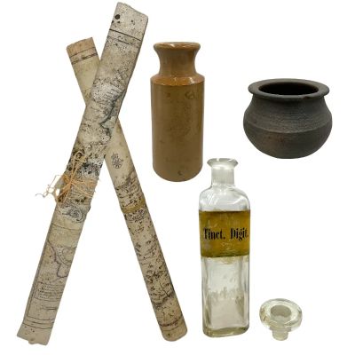 Lot 147: The Bluff Secret Bunker Screen Used (2) Jars, Bottle & (2) Maps | VIP Fan Auctions