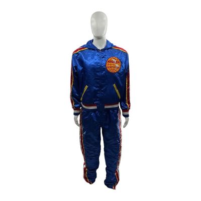 Lot 44: Marty Supreme Harlem Globetrotter Screen Worn Harlem Globetrotter Uniform Warm Up Jacket & Harlem Globetrotter Uniform Warm Up Pants | VIP Fan Auctions
