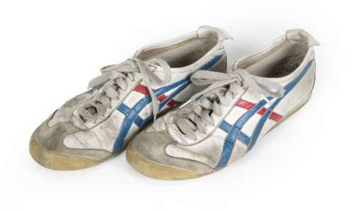 BRUCE LEE THE GAME OF DEATH WORN ASICS SNEAKERS | Julien’s