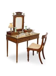 The Crown - Lot 123 - Claire Foy, Olivia Colman & Imelda Staunton (as the Queen): a French early 20th century mahogany and gilt-brass mounted dressing table, in the Directoire-styleFirst seen in Season 1 (qty)