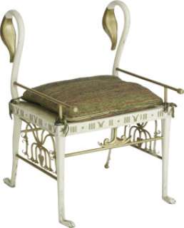 "Cleopatra" Backless Prop Chair. A gold-and-white painted wooden chair from the movie, with scrolling arms decorated with wo... | Heritage