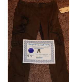 Jennifer Lawrence on screen worn and distressed arena pants from HUNGER GAMES the first film with il | Piece of the Past