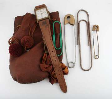 Lot 4662 - The Borrowers (1997) Collection of props including giant Seiko watch, giant backpack / bag, two…