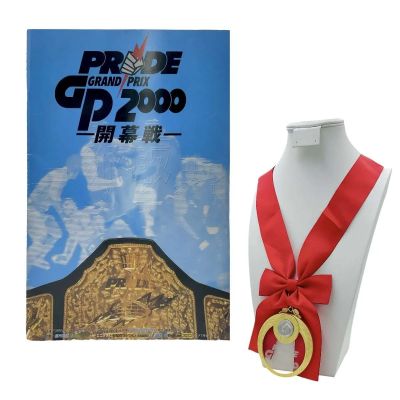 The Smashing Machine Mark Kerr (Dwayne Johnson) Screen Used Medal & Grand Prix 2000 Pamphlet | VIP Fan Auctions