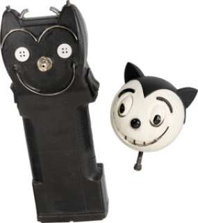 Batman Returns (Warner Bros., 1992), Michelle Pfeiffer "Catwoman" O-Mega Stun Gun Taser and Christopher Walken "Max Shreck" Cat Maquette. (Total: 2 Items)