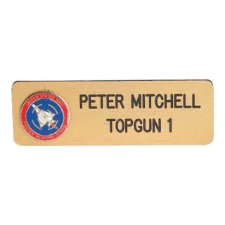 TOP GUN (1986) - Lot #422 : Pete "Maverick" Mitchell‘s (Tom Cruise) Uniform Nameplate
