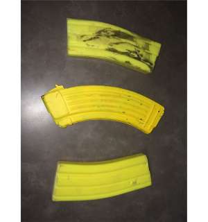 Lot 326 - Chappie 2015 Sci-Fi Movie "Ninja" Production Used Yellow M4A1 Rifle Magazine Prop Lot