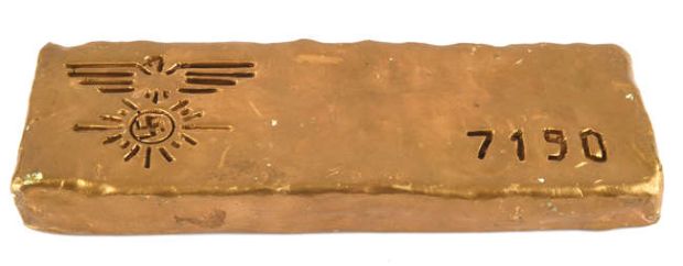 Lot 2099 - James Bond 007 Goldfinger (1964) - Replica prop gold bar, gold-painted plaster, a prop gold bar of… | Ewbank’s