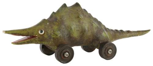 Lot 608 - Christina Ricci ‘Wednesday Addams‘ dinosaur toy from Addams Family Values.