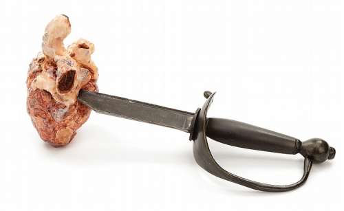 Lot 616 - "Davy Jones" Heart & "Cap‘n Jack Sparrow" sword from Pirates of the Caribbean at World‘s End.