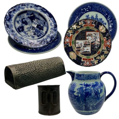 Lot 138: The Bluff Ercell Screen Used (4) Plates, Porcelain Pitcher, Metal Cup & Rubber Coconut Grater | VIP Fan Auctions