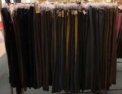 "Superheroes Show" Rack full of broken-down military pants w/ belts (approx. 55 pcs, rack not includ | Direct Liquidation