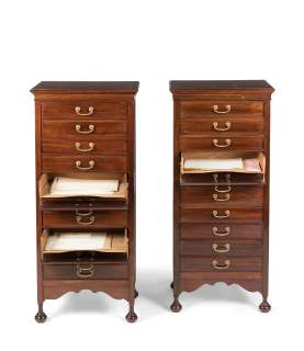 The Crown - Lot 199 - A pair of Stone‘s Patent mahogany music score filing cabinets, first half 20th centuryFirst seen in Season 1, in the Prince Phillip Bedroom set (2)