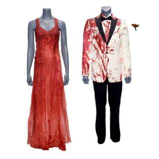 Carrie (2013) | 571. Carrie White’s (Chloe Grace Moretz) Bloodied Prom Dress with Tommy Ross’ (Ansel Elgort) Screen-Matched Bloodied Prom Tuxedo Costume | Propstore