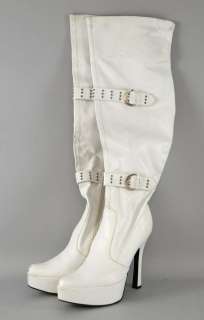 Goal 3 - A pair of white high heel, knee high boots clearly seen worn by one of the glamour girl’s… | Ewbank’s